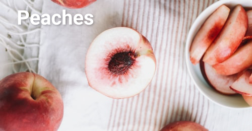 Peaches Family Tree Farms white peach halved and sliced.